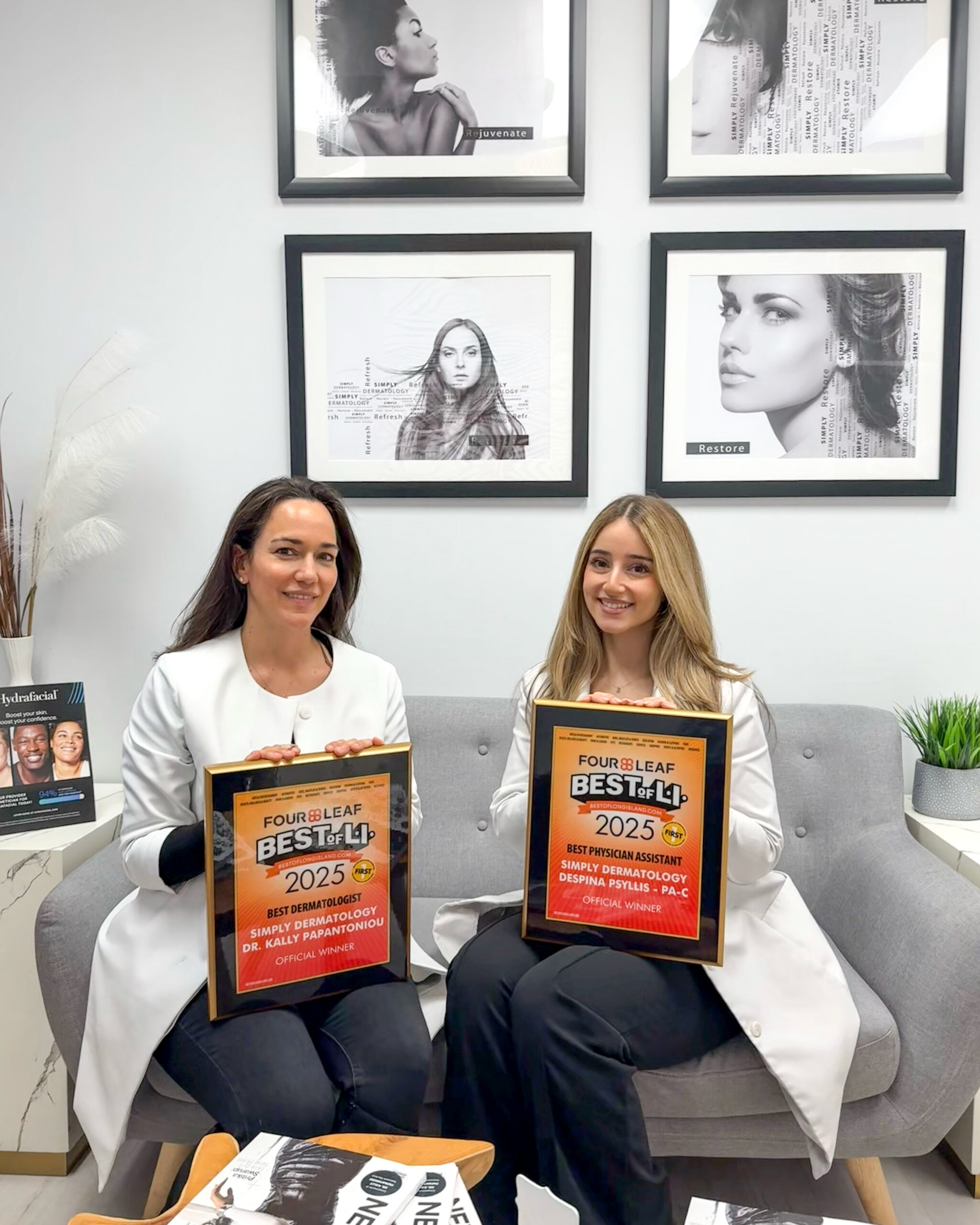 Dr. Kally Papantoniou and Despina Psyllis, PA-C, holding Best of Long Island awards at Simply Dermatology.