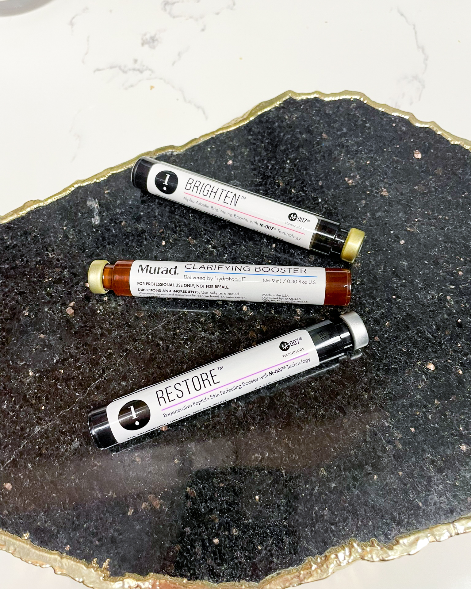 HydraFacial booster vials Brighten, Clarifying, and Restore at Simply Dermatology Melville.