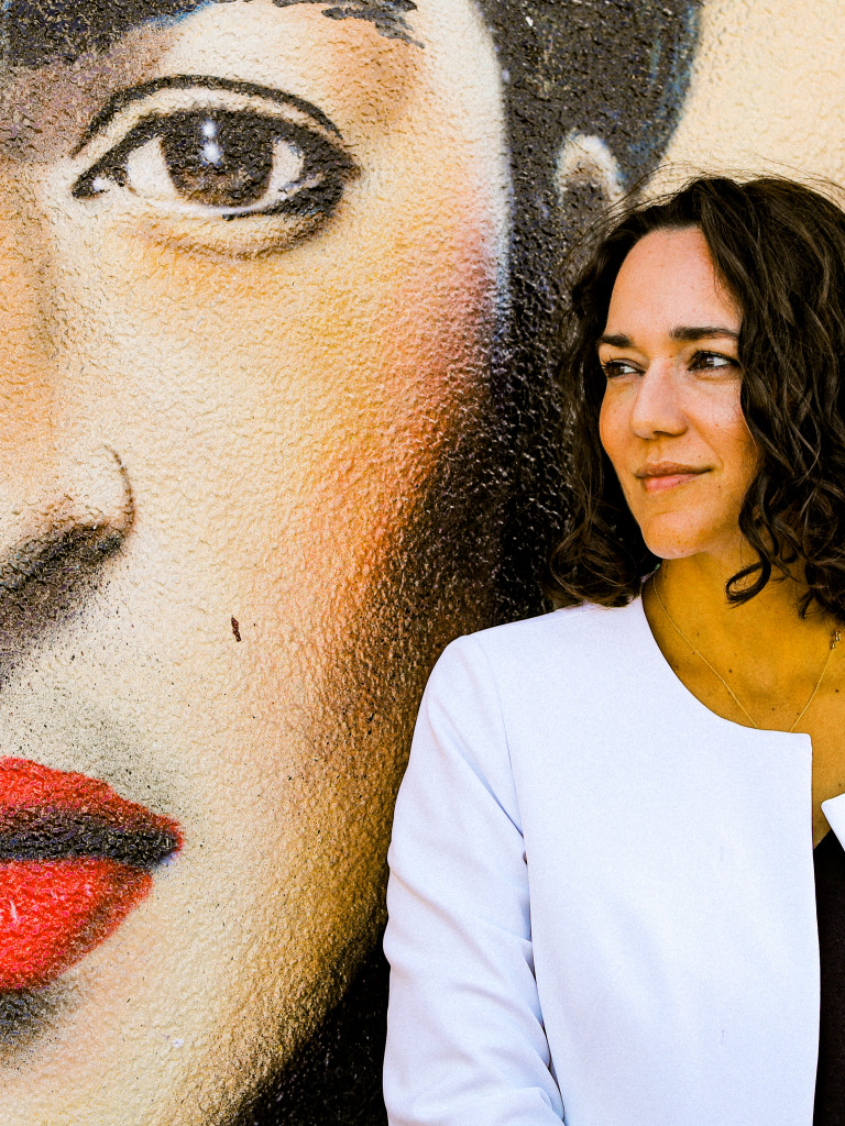 Dr. Papantoniou Cosmetic Dermatologist against graffiti wall