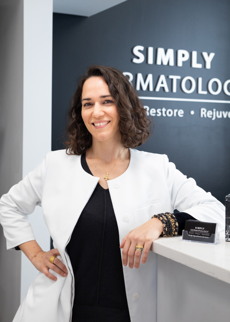 Dr. Kally Papantoniou, Board Certified Dermatologist and five-time Best of Long Island winner, at Simply Dermatology in Melville, NY.