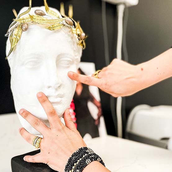 Inspecting a sculpture