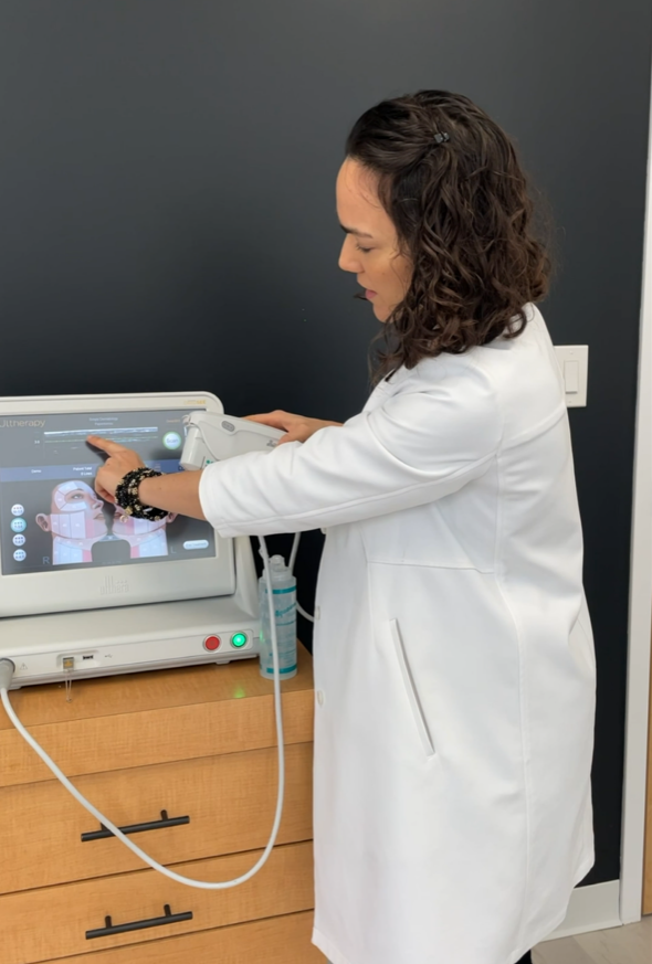 Dr. Kally Papantoniou preparing the Ultherapy system at Simply Dermatology