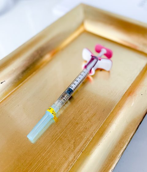 Filler on a golden tray at Simply Derm
