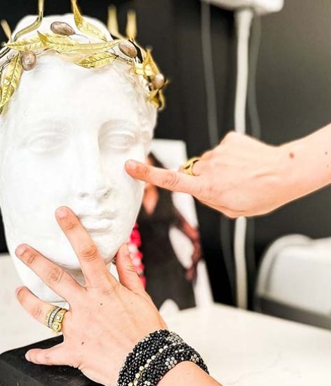 Inspecting a sculpture